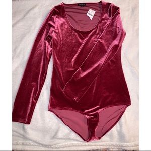 Fuschia long sleeve bodysuit